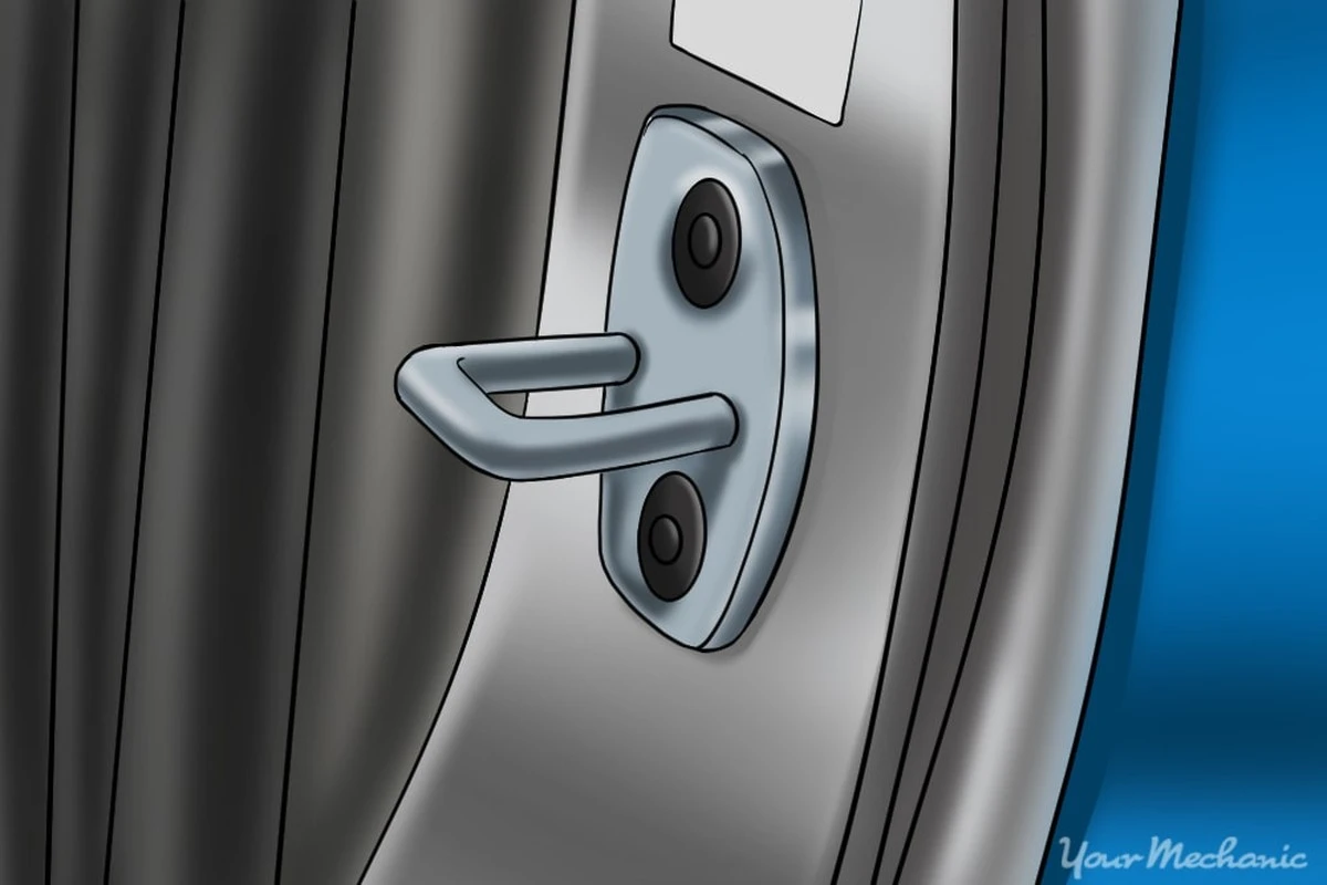 Waarom die metalen haak in je autodeur belangrijker is dan je denkt - image 1